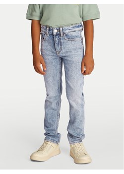 Calvin Klein Jeans Jeansy IB0IB02475 Niebieski Slim Fit ze sklepu MODIVO w kategorii Spodnie chłopięce - zdjęcie 182642806