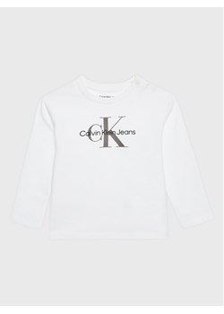 Calvin Klein Jeans Bluzka Monogram IN0IN00005 Biały Regular Fit ze sklepu MODIVO w kategorii T-shirty chłopięce - zdjęcie 182642989
