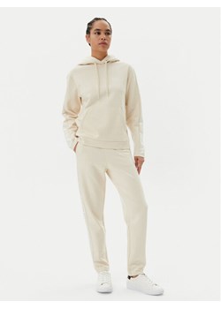 EA7 Emporio Armani Dres 7W000116 AF10443 U1079 Beżowy Regular Fit ze sklepu MODIVO w kategorii Dresy damskie - zdjęcie 182643139