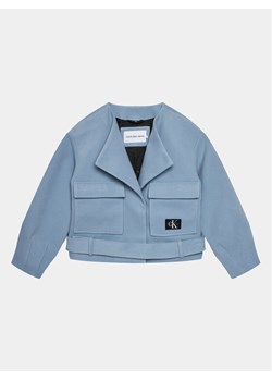 Calvin Klein Jeans Kurtka przejściowa IG0IG02334 Niebieski Relaxed Fit ze sklepu MODIVO w kategorii Kurtki dziewczęce - zdjęcie 182643235