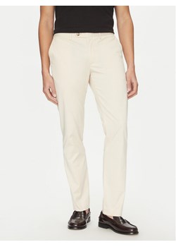Tommy Hilfiger Chinosy Denton MW0MW38863 Beżowy Slim Fit ze sklepu MODIVO w kategorii Spodnie męskie - zdjęcie 182643785