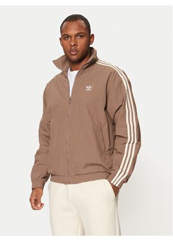 adidas Bluza adicolor Firebird JP1023 Beżowy Loose Fit ze sklepu MODIVO w kategorii Bluzy męskie - zdjęcie 182644208