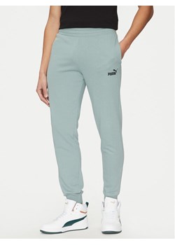 Puma Spodnie dresowe Ess No. 1 Logo 682609 Zielony Regular Fit ze sklepu MODIVO w kategorii Spodnie męskie - zdjęcie 182645189