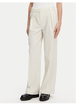Calvin Klein Spodnie palazzo K20K208217 Beżowy Wide Leg ze sklepu MODIVO w kategorii Spodnie damskie - zdjęcie 182645428
