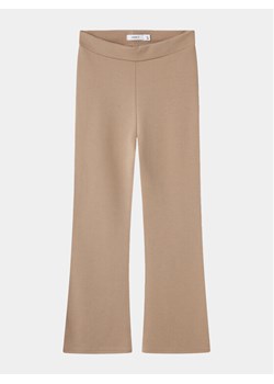 NAME IT Spodnie materiałowe 13177337 Beżowy Bootcut Fit ze sklepu MODIVO w kategorii Spodnie dziewczęce - zdjęcie 182646755