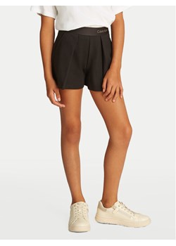 Calvin Klein Jeans Szorty materiałowe Punto IG0IG02880 Czarny Regular Fit ze sklepu MODIVO w kategorii Spodenki dziewczęce - zdjęcie 182650138