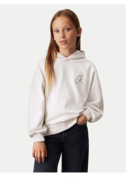 Calvin Klein Jeans Bluza Signage IG0IG02640 Écru Regular Fit ze sklepu MODIVO w kategorii Bluzy dziewczęce - zdjęcie 182652125