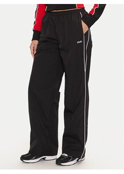 Fila Spodnie dresowe Laplace FAW0891 Czarny Loose Fit ze sklepu MODIVO w kategorii Spodnie damskie - zdjęcie 182652489