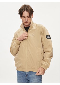 Calvin Klein Jeans Kurtka przejściowa Harrington J30J325102 Beżowy Regular Fit ze sklepu MODIVO w kategorii Kurtki męskie - zdjęcie 182653306
