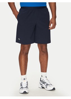 Lacoste Szorty sportowe GH7452 Granatowy Regular Fit ze sklepu MODIVO w kategorii Spodenki męskie - zdjęcie 182653319