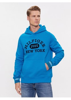 Tommy Hilfiger Bluza Collegiate MW0MW32682 Niebieski Regular Fit ze sklepu MODIVO w kategorii Bluzy męskie - zdjęcie 182653618