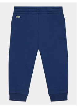 Lacoste Spodnie dresowe XJ1213 Granatowy Regular Fit ze sklepu MODIVO w kategorii Spodnie chłopięce - zdjęcie 182653999