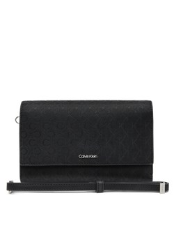 Calvin Klein Duży Portfel Damski Ck Must Xl Trifold W/Wristel_Mn K60K612940 Czarny ze sklepu MODIVO w kategorii Portfele damskie - zdjęcie 182654018
