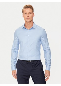 Calvin Klein Koszula K10K113528 Niebieski Slim Fit ze sklepu MODIVO w kategorii Koszule męskie - zdjęcie 182654847