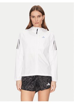 adidas Kurtka do biegania Own The Run IK7445 Biały Regular Fit ze sklepu MODIVO w kategorii Kurtki damskie - zdjęcie 182656706