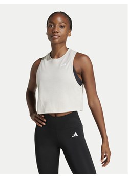 adidas Koszulka techniczna Train Essentials Boxy Workout JC9557 Beżowy Regular Fit ze sklepu MODIVO w kategorii Bluzki damskie - zdjęcie 182656748