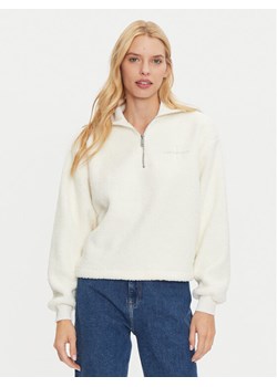 Calvin Klein Jeans Bluza J20J224180 Écru Relaxed Fit ze sklepu MODIVO w kategorii Bluzy damskie - zdjęcie 182657975