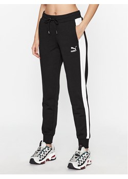 Puma Spodnie dresowe Iconic T7 530082 Czarny Regular Fit ze sklepu MODIVO w kategorii Spodnie damskie - zdjęcie 182658447
