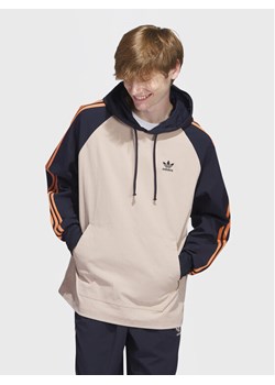 adidas Bluza SST Hooded Windbreaker IC5537 Brązowy Regular Fit ze sklepu MODIVO w kategorii Bluzy męskie - zdjęcie 182658798