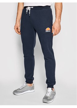 Ellesse Spodnie dresowe Ovest SHS01763 Granatowy Regular Fit ze sklepu MODIVO w kategorii Spodnie męskie - zdjęcie 182659248