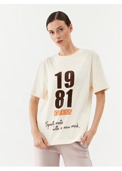 Guess T-Shirt V3BI00 KA260 Beżowy Regular Fit ze sklepu MODIVO w kategorii Bluzki damskie - zdjęcie 182659628