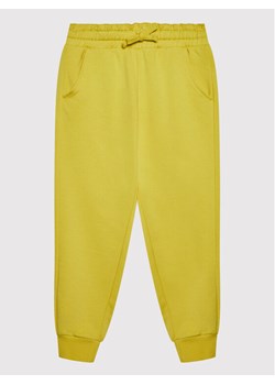 United Colors Of Benetton Spodnie dresowe 3QLACF00H Żółty Regular Fit ze sklepu MODIVO w kategorii Spodnie dziewczęce - zdjęcie 182660256