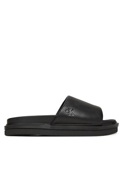 Calvin Klein Jeans Klapki Flat Molded Slide Sandal Lth YM0YM01225 Czarny ze sklepu MODIVO w kategorii Klapki męskie - zdjęcie 182660338