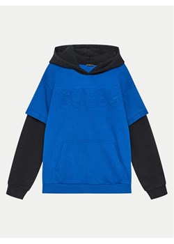 Guess Bluza L4YQ01 KA6R3 Niebieski Regular Fit ze sklepu MODIVO w kategorii Bluzy chłopięce - zdjęcie 182660477