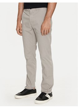 Boss Chinosy 50513036 Beżowy Slim Fit ze sklepu MODIVO w kategorii Spodnie męskie - zdjęcie 182661626