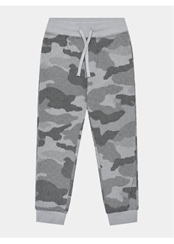 United Colors Of Benetton Joggery 31MXCF049 Szary Regular Fit - id: 0000303214173 - marki United Colors Of Benetton - 182661645 United Colors Of Benetton Joggery 31MXCF049 Szary Regular Fit ze sklepu MODIVO w kategorii Spodnie chłopięce - zdjęcie 182661645