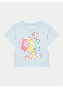 Guess T-Shirt K4RI28 K8HM0 Błękitny Boxy Fit ze sklepu MODIVO w kategorii Bluzki dziewczęce - zdjęcie 182662017