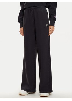 Champion Spodnie dresowe 117661 Czarny Wide Leg ze sklepu MODIVO w kategorii Spodnie damskie - zdjęcie 182663339