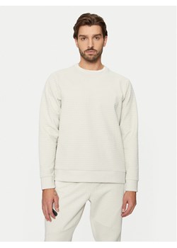 Under Armour Bluza UA Unstoppable 1387904 Écru Regular Fit ze sklepu MODIVO w kategorii Bluzy męskie - zdjęcie 182664319