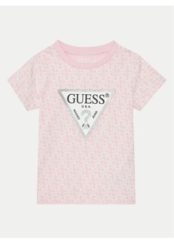 Guess T-Shirt K5RI15 K6YW4 Różowy Regular Fit ze sklepu MODIVO w kategorii Bluzki dziewczęce - zdjęcie 182664748