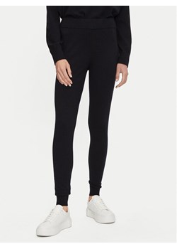 Athlecia Spodnie dresowe Dava W Knitted EA243385 Czarny Regular Fit ze sklepu MODIVO w kategorii Spodnie damskie - zdjęcie 182664865
