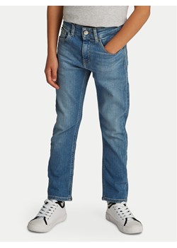 Calvin Klein Jeans Jeansy Essential IB0IB02306 Niebieski Relaxed Fit ze sklepu MODIVO w kategorii Spodnie chłopięce - zdjęcie 182666747