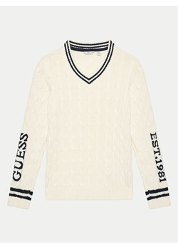 Guess Sweter Mini Me C L4RR03 Z30W1 Écru Regular Fit ze sklepu MODIVO w kategorii Spodnie chłopięce - zdjęcie 182667357
