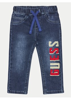 Guess Jeansy I4BA00 D4CA0 Granatowy Relaxed Fit ze sklepu MODIVO w kategorii Spodnie i półśpiochy - zdjęcie 182667628