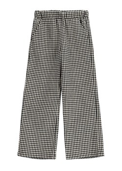 Coccodrillo Spodnie materiałowe WC5119102RGJ Czarny Relaxed Fit ze sklepu MODIVO w kategorii Spodnie dziewczęce - zdjęcie 182668326