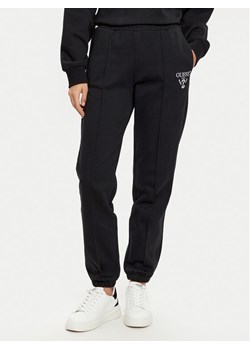 Guess Spodnie dresowe V5RB13 KC3D2 Czarny Regular Fit ze sklepu MODIVO w kategorii Spodnie damskie - zdjęcie 182668468