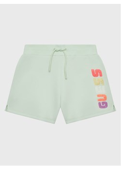 Guess Szorty sportowe J3GD21 FL04P Zielony Relaxed Fit ze sklepu MODIVO w kategorii Spodenki dziewczęce - zdjęcie 182668648