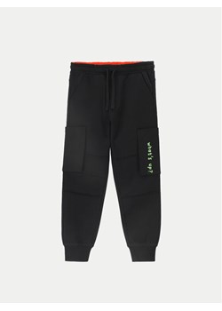 Coccodrillo Spodnie dresowe ZC4120102GBK Czarny Regular Fit ze sklepu MODIVO w kategorii Spodnie chłopięce - zdjęcie 182668835