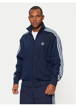 adidas Bluza adicolor Classics Firebird JP2544 Granatowy Loose Fit ze sklepu MODIVO w kategorii Bluzy męskie - zdjęcie 182669758