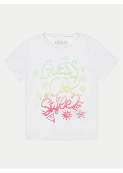 Guess T-Shirt K4GI04 K6YW1 Biały Regular Fit ze sklepu MODIVO w kategorii Bluzki dziewczęce - zdjęcie 182670029