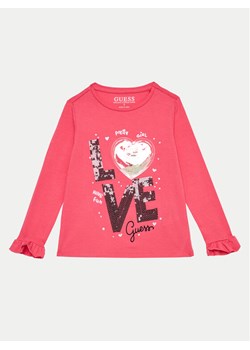 Guess Bluzka K4BI11 J1314 Różowy Regular Fit ze sklepu MODIVO w kategorii Bluzki dziewczęce - zdjęcie 182670088