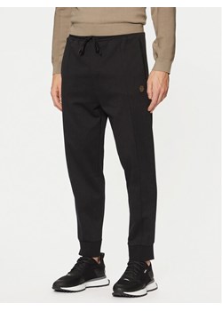BOSS Spodnie dresowe Hadiko TL 50543434 Czarny Regular Fit ze sklepu MODIVO w kategorii Spodnie męskie - zdjęcie 182670445