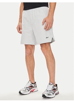 Reebok Szorty sportowe Strength 100075594 Szary Regular Fit ze sklepu MODIVO w kategorii Spodenki męskie - zdjęcie 182671479