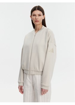 adidas Bluza Essentials Contemporary Logo JD9972 Beżowy Loose Fit ze sklepu MODIVO w kategorii Bluzy damskie - zdjęcie 182671839