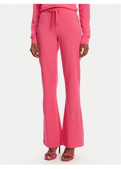 Juicy Couture Spodnie dresowe Apollo JCWBJ125311 Różowy Flared Leg ze sklepu MODIVO w kategorii Spodnie damskie - zdjęcie 182672226