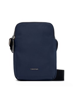 Calvin Klein Saszetka Business Tech Reporter Xs K50K512888 Granatowy ze sklepu MODIVO w kategorii Torby męskie - zdjęcie 182672308